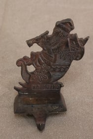 Victorian cast iron wall hook in the form of santa