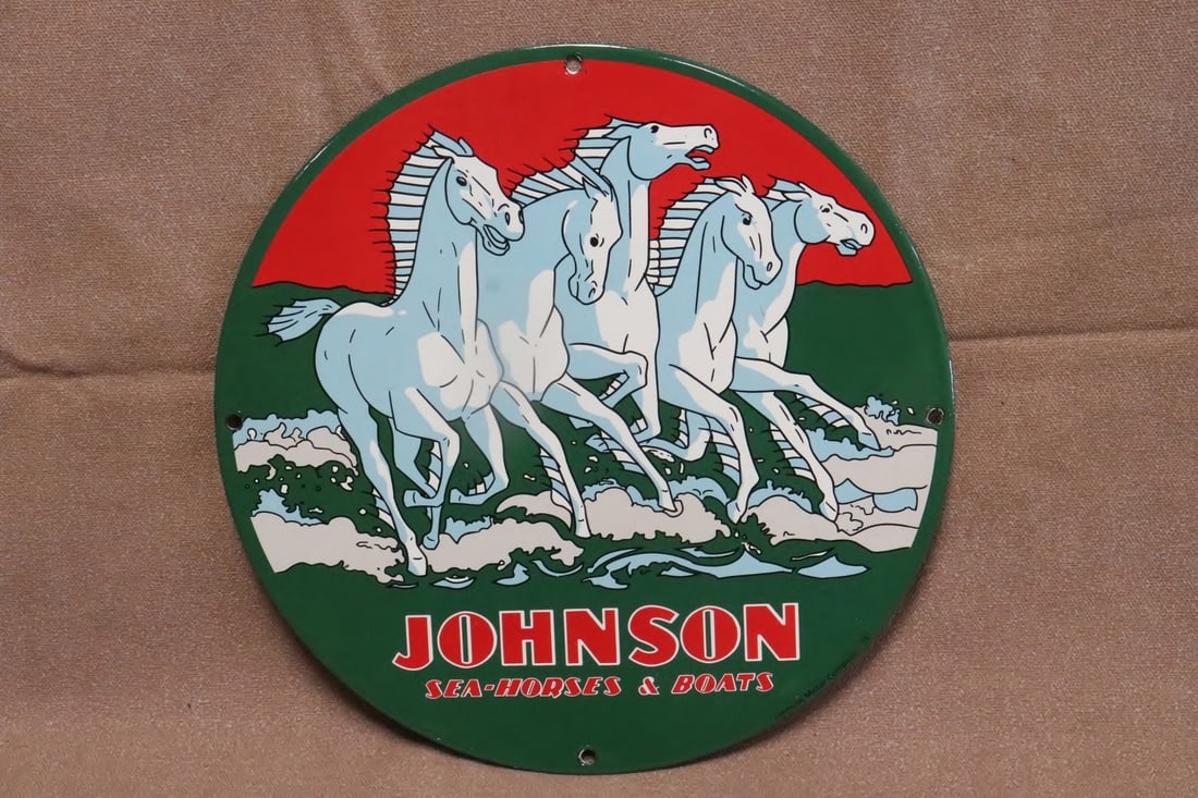 Enamel on metal advertising sign: Enamel on metal advertising sign for "Johnson seashores and boats", 0.05"x11.8"dia