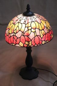 A leaded glass shade table lamps
