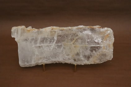A calcite crystal slab with stand
