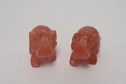 2 pink tourmaline carved elephants