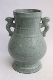 Chinese 19th/20th c. celadon crackleware handled jar