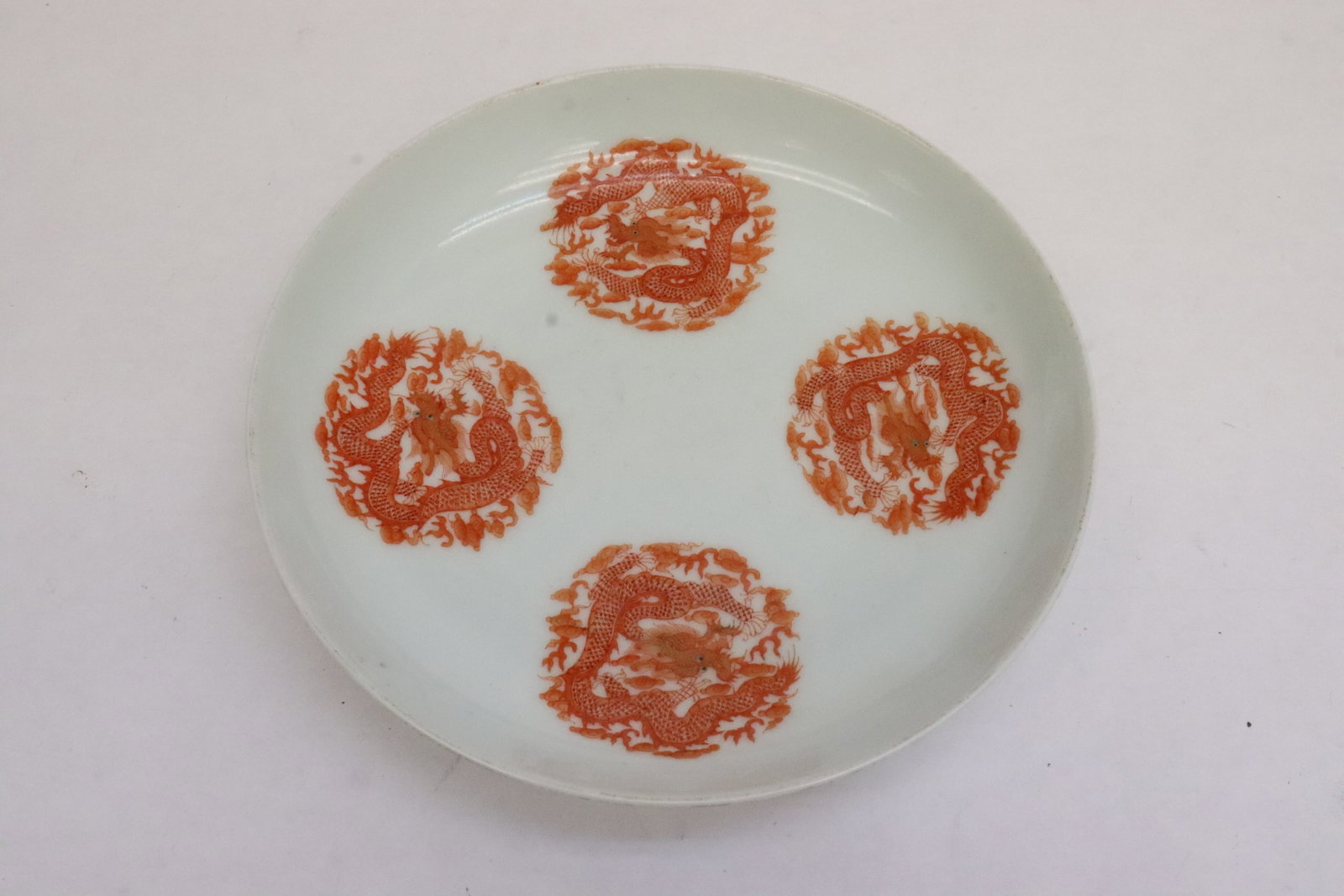 Red and white porcelain plate: Red and white porcelain plate, 1.65"x8.15"dia