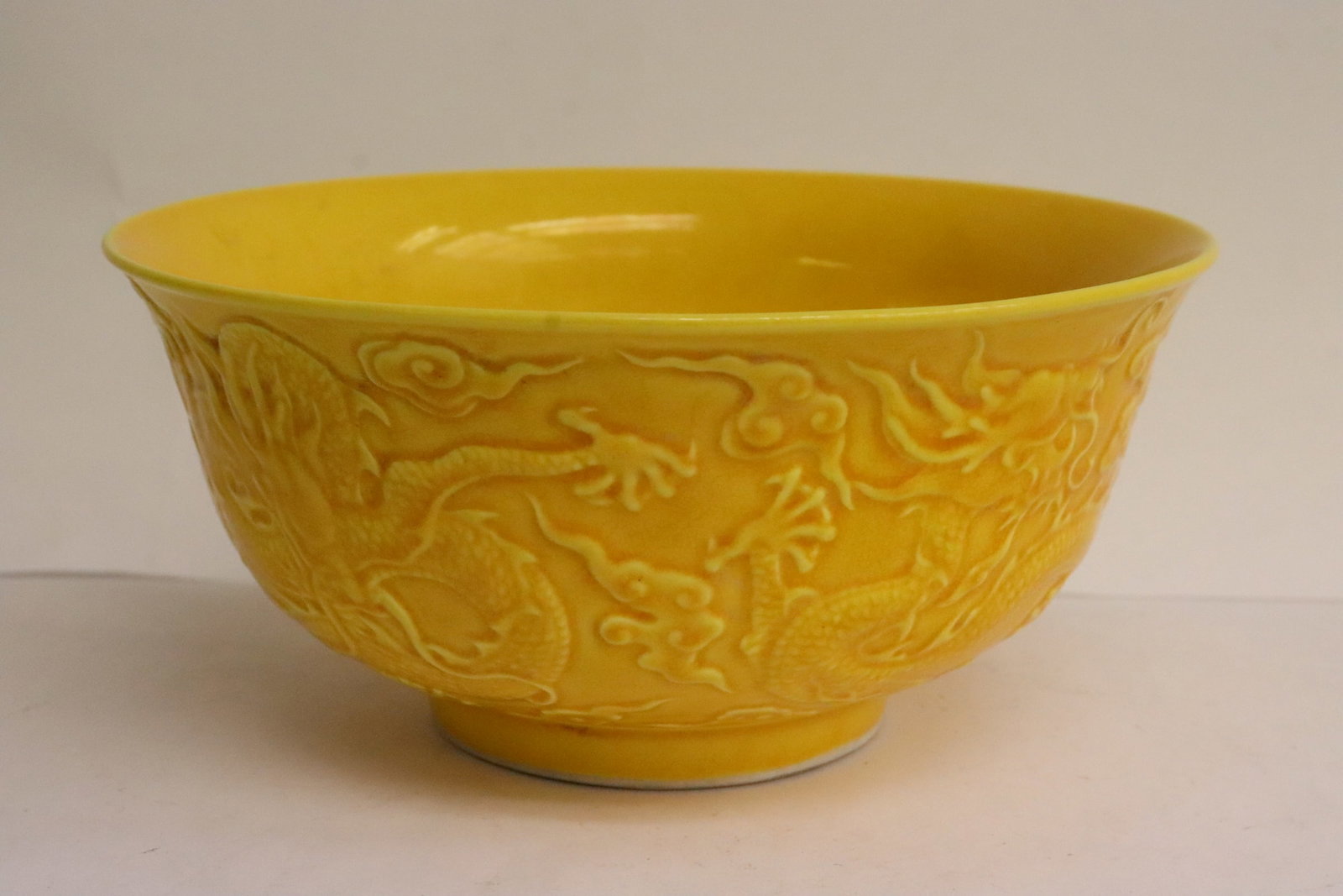 Yellow glazed porcelain bowl: Yellow glazed porcelain bowl with embossed decoration, 2.85"x6.15"dia