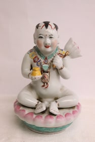 Chinese 19th/20th c. wucai porcelain sculpture of baby