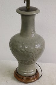 A celadon vase made as lamp