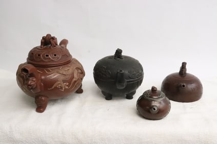 4 Yixing teapots