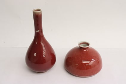 A red glazed vase, and a red glazed water dripper