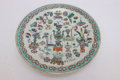 A vintage Chinese famille rose porcelain plate