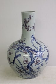A massive blue, red and white porcelain bottle vase