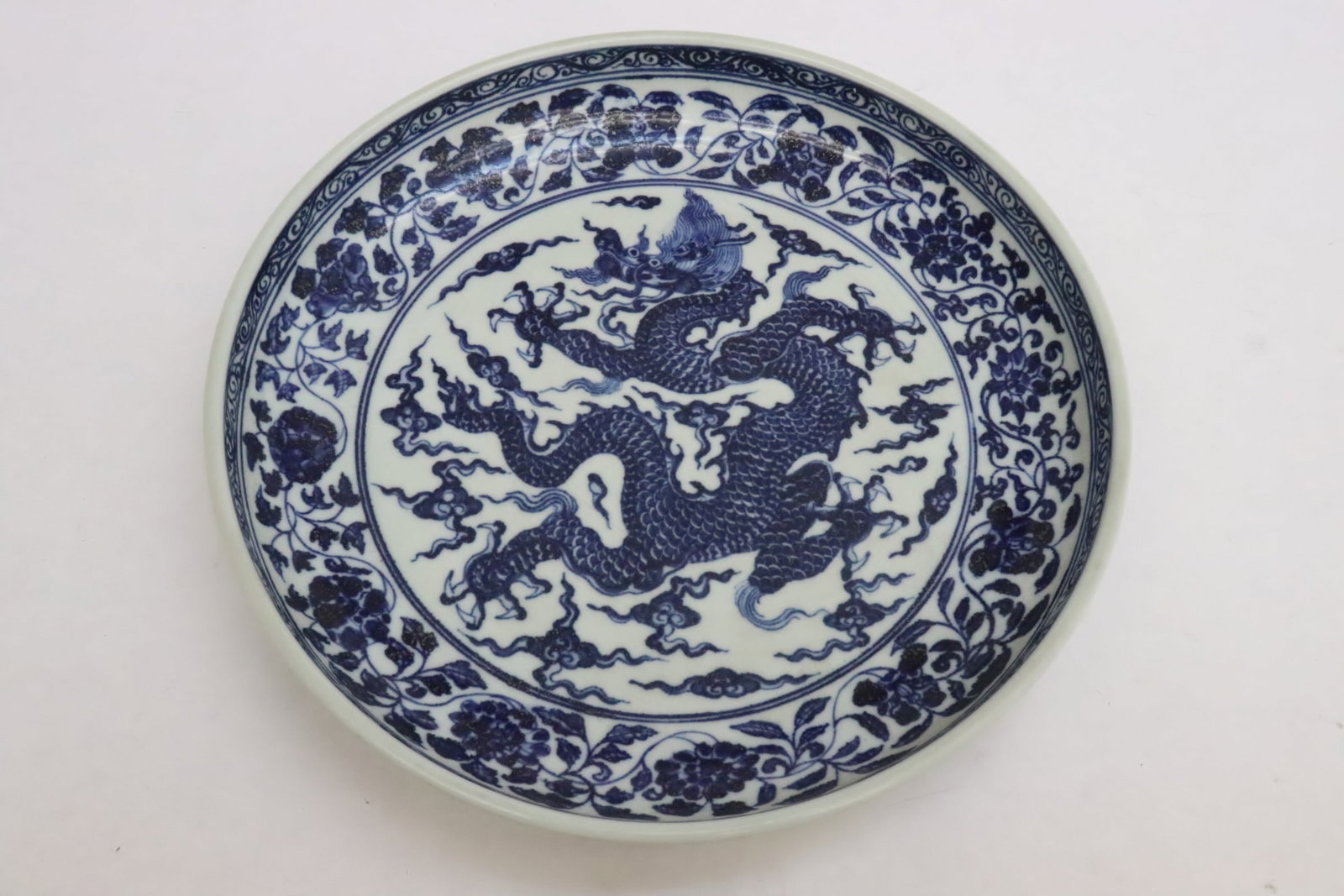A blue and white porcelain plate: A blue and white porcelain plate, 2"x10.45"dia