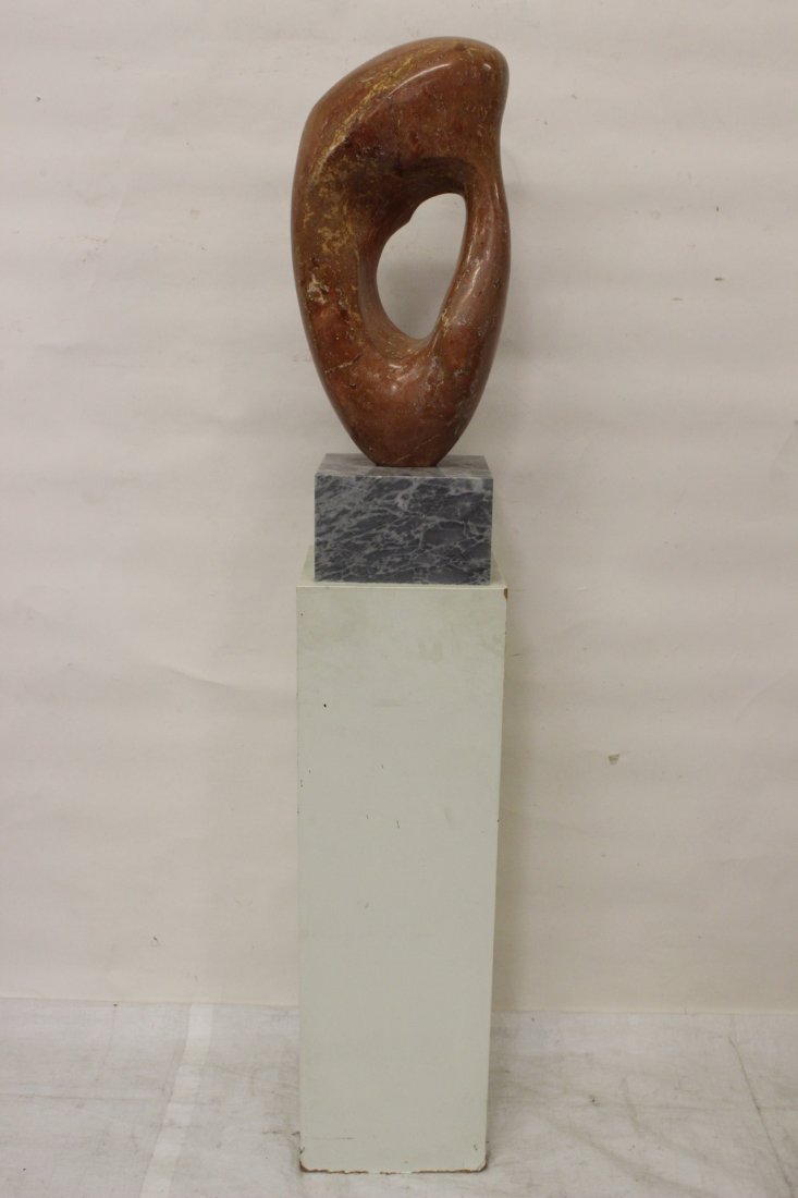 large modern marble sculpture on display stand: A large modern marble sculpture (30.5"Hx10.25"x10.25")on display stand (36.5"Hx12.2"x12.2") (unsigned)