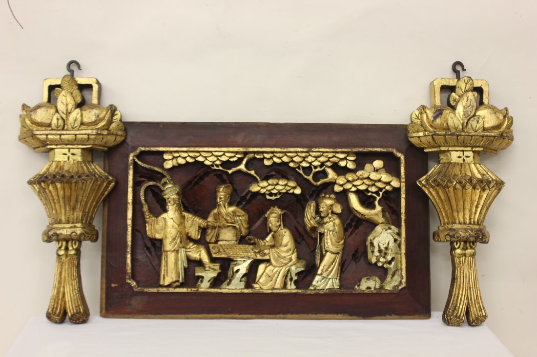 Chinese 19th c. gilt wood carved panel: Chinese 19th century gilt wood carved panel (12.9"Hx21.5"x1.5") depicting Daoism gods, accented by 2 antique gilt wood carved ornament (16.25"Hx7.2"x1.75" each)