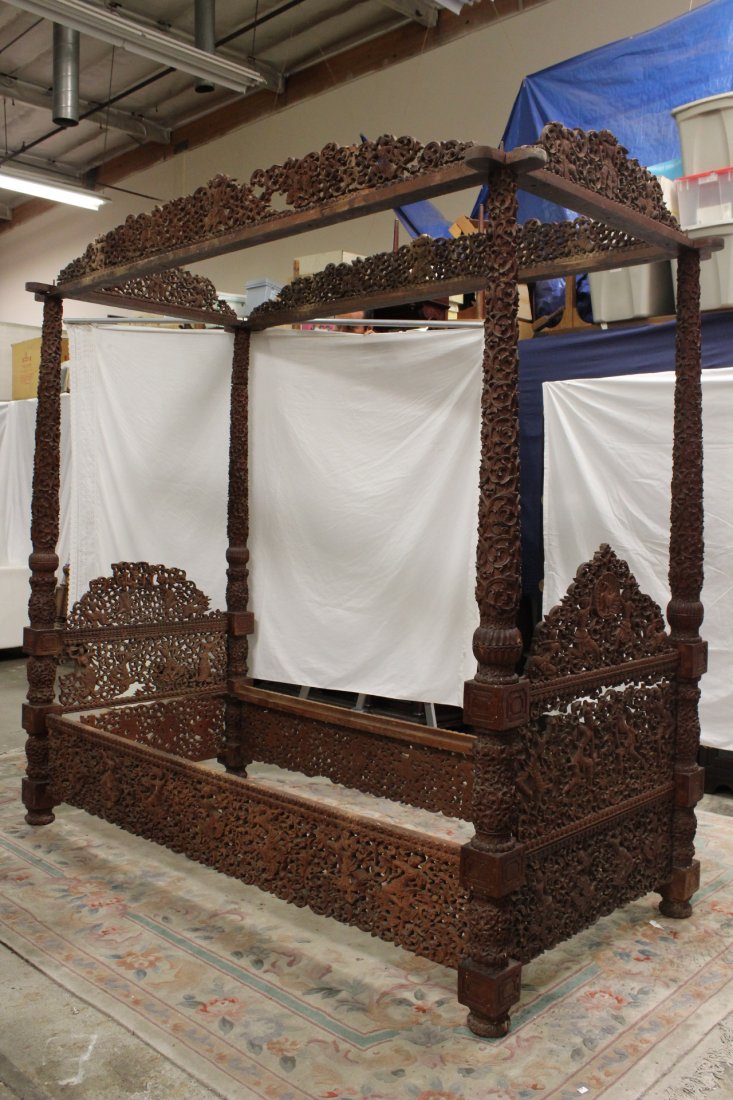 antique wood carved poster bed: A beautiful antique wood carved poster bed with elaborate carving to depict Hindu god in reticulate style, 91"Hx90.5"x42"