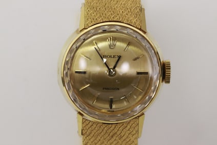 Lady's 18K Rolex wrist watch w/ 18K original band
