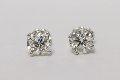 Pair 14K W/G diamond earrings