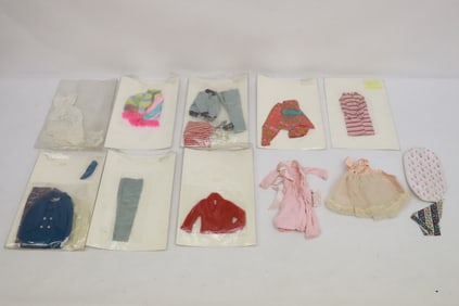 Lot of Barbie and Barbie style doll clothes