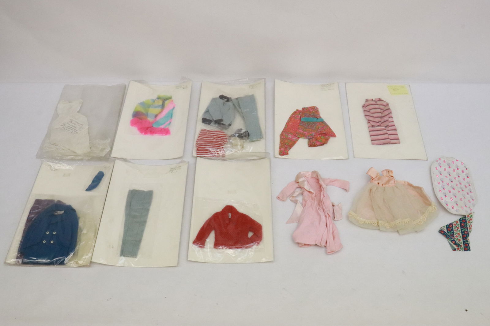 Lot of Barbie and Barbie style doll clothes: Lot of Barbie and Barbie style doll clothes