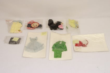 Lot of Barbie and Barbie style doll clothes