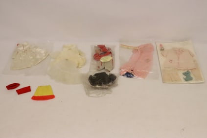 Lot of Barbie and Barbie style doll clothes