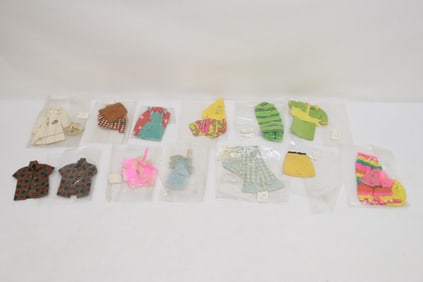 Lot of Barbie and Barbie style doll clothes