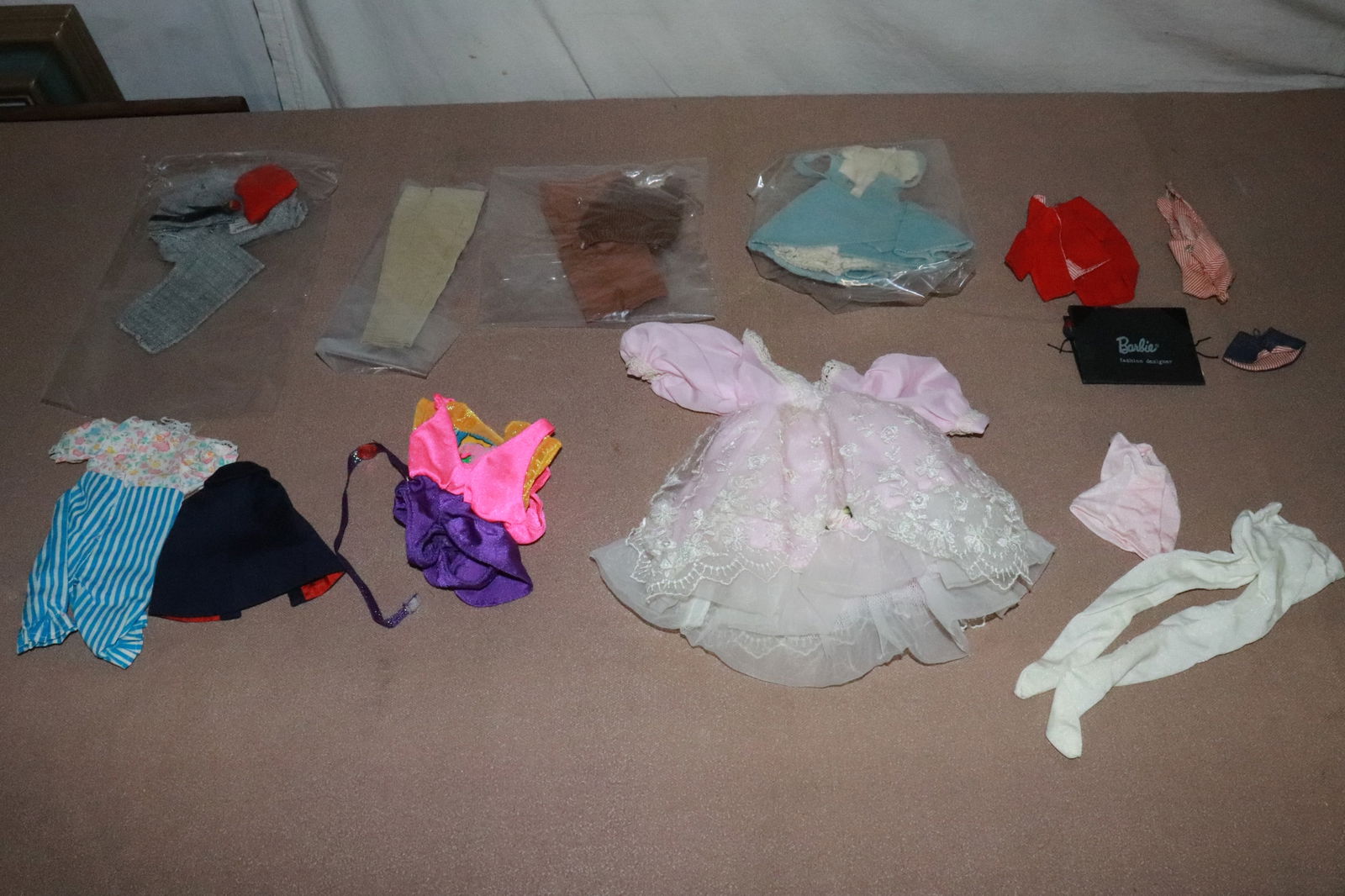 Lot of Barbie and Barbie style doll clothes: Lot of Barbie and Barbie style doll clothes