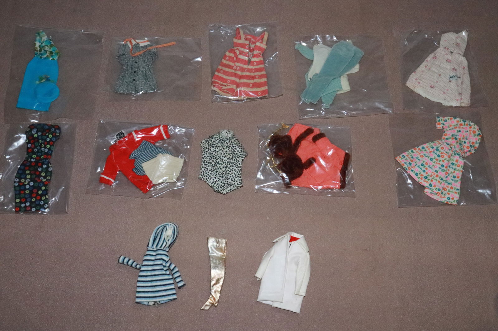Lot of Barbie and Barbie style doll clothes: Lot of Barbie and Barbie style doll clothes