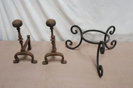 pair cast iron andirons, and a cast iron plant stand
