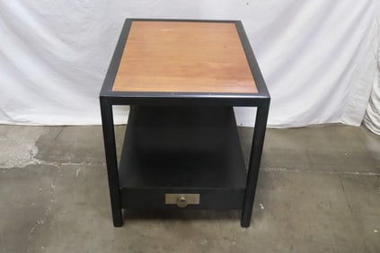 A signed Baker side table with drawers