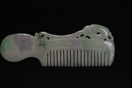 A very rare jadeite carved comb