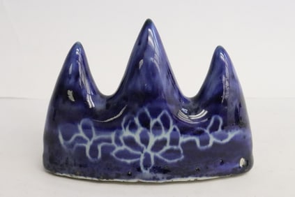 A blue glazed porcelain brush mountain