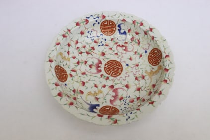 A vintage Chinese famille rose porcelain plate