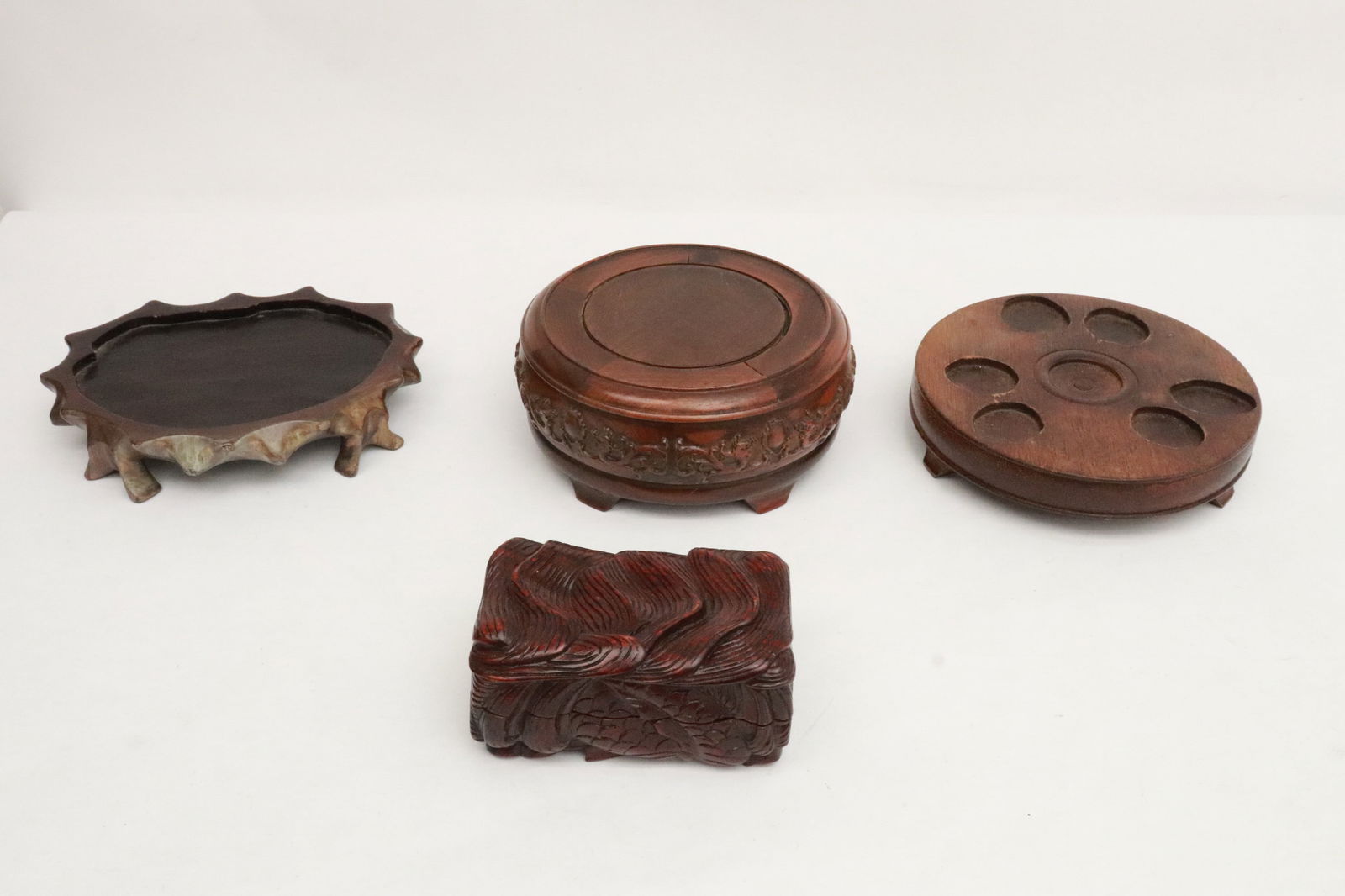 3 Chinese wood stands, and a wood box: 4 pieces; 3 Chinese wood stands (3"x6.8"dia - 1.65"x7.05"dia), and a wood box (3.15"x5"x2.6")