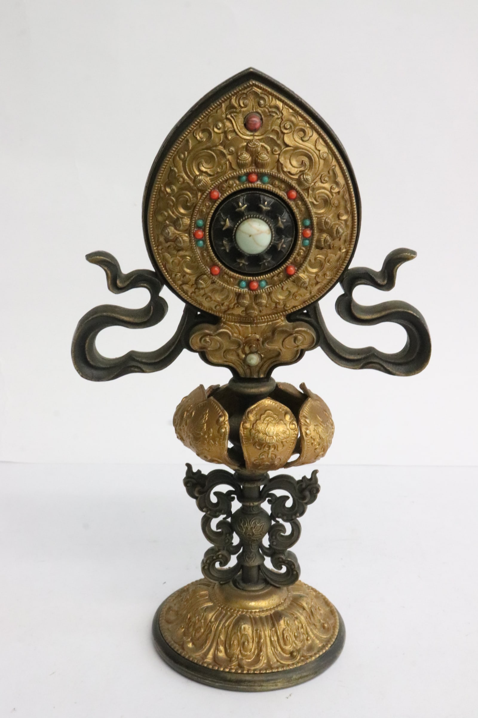 A gilt metal religious ornament with jewels: Unusual possible Tibetan gilt metal religious ornament with jewels, 7.35"H