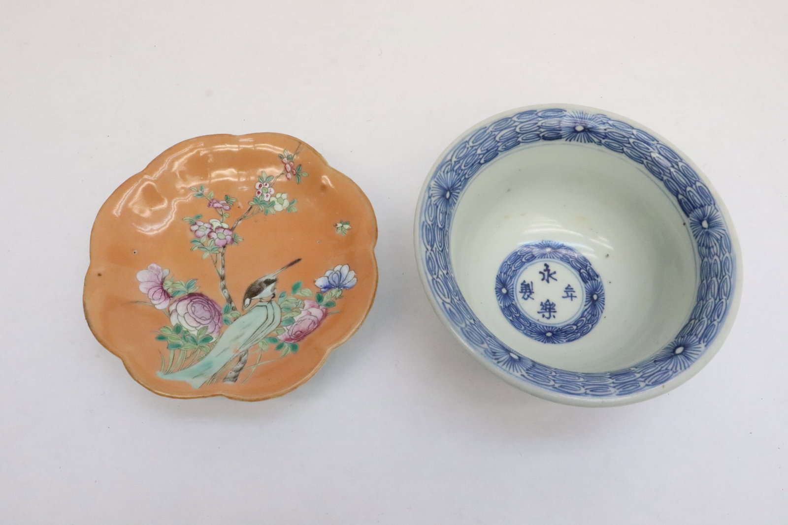2 porcelain pieces: 2 pieces; a blue and white bowl (2.7"x5.7"dia), and a famille rose porcelain plate (1.6"x5.65"x5.65")