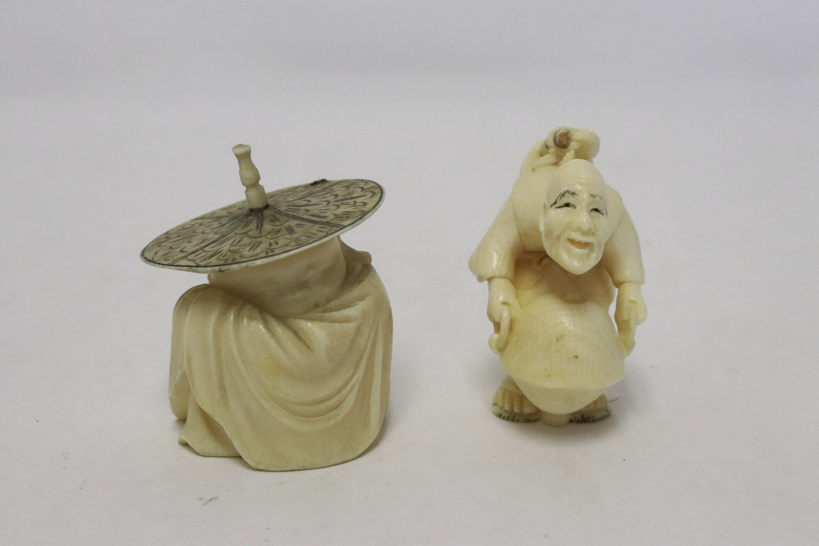 2 Japanese bone carved netsukes: 2 Japanese bone carved netsukes, 1.75"H, 1.85"H