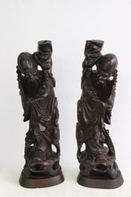 2 large wood carved deities