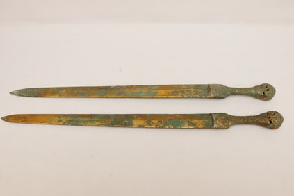 2 bronze swords