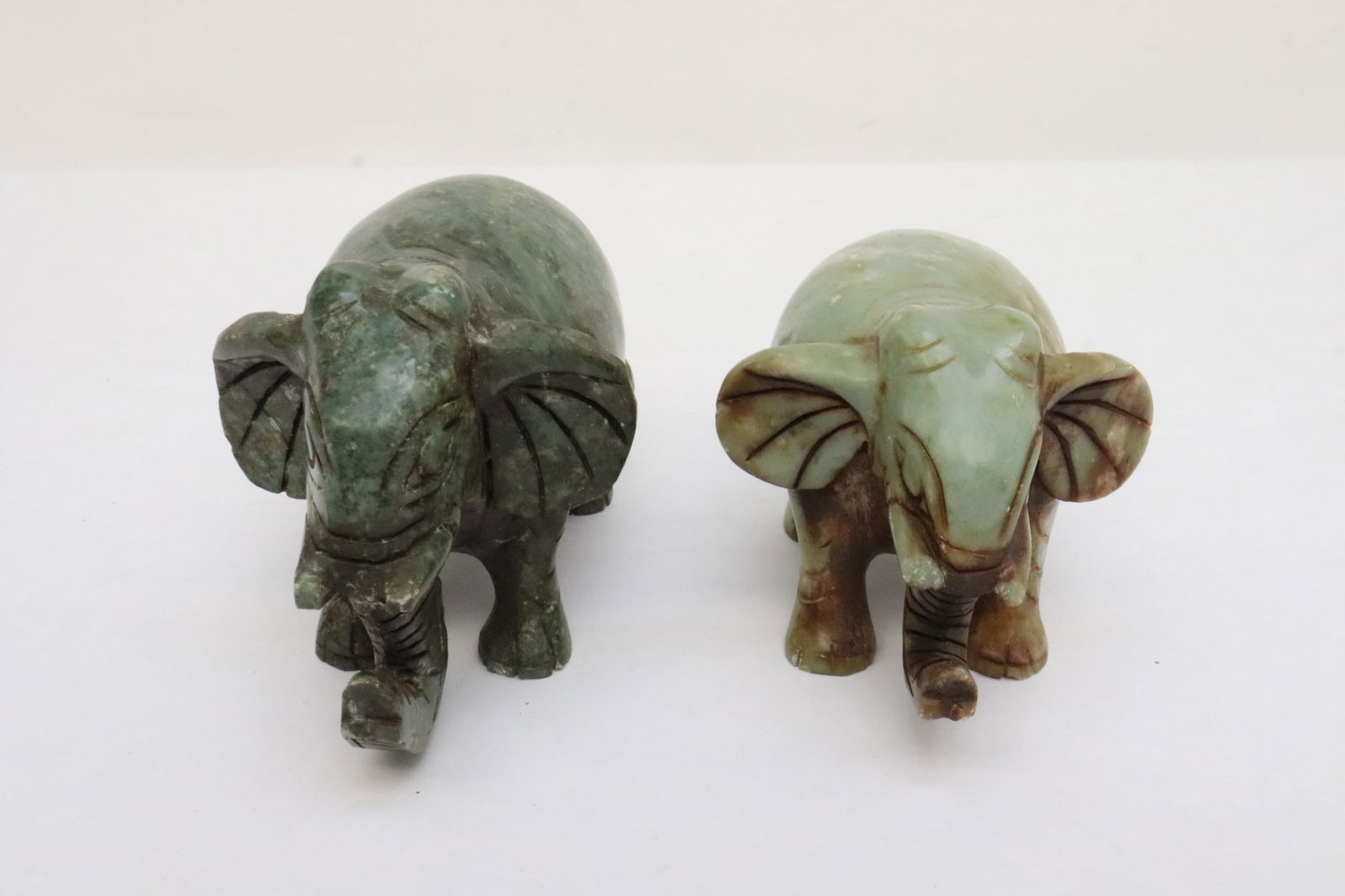 2 jade like stone carved elephant, trunk broken (1 of 10)