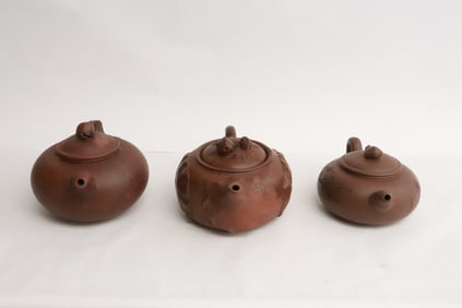 3 Yixing teapots