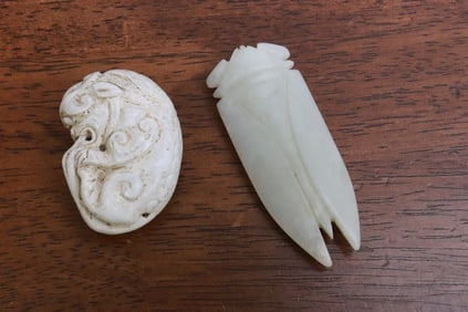 2 jade like stone carved ornaments