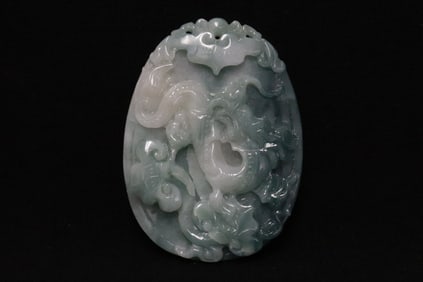A rare blue tint jadeite carved pendant