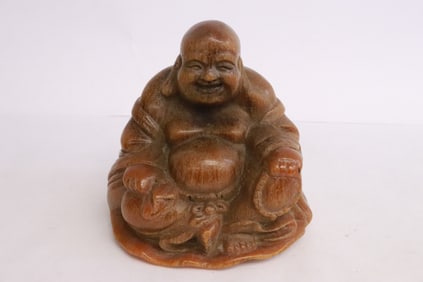 A horn style sculpture of deity