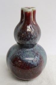 A Chinese blue on red porcelain vase