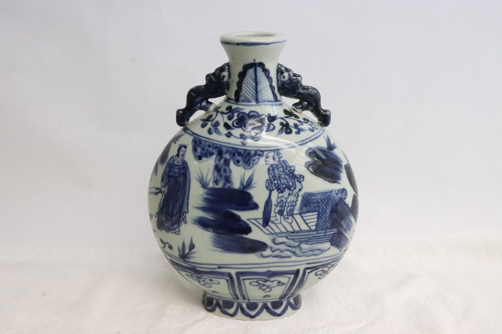 A blue and white porcelain flask: A blue and white porcelain flask, 10.15"x4.4"x7.65"