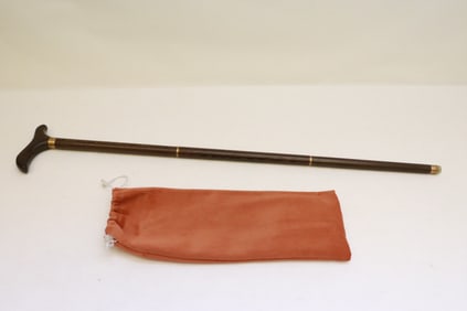 A wood cane, 36.85"L