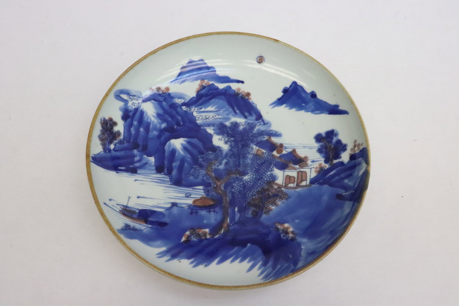 A blue and white porcelain plate: A blue and white porcelain plate, 1.65"x8.8"dia