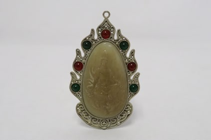White metal pendant with jade like inset