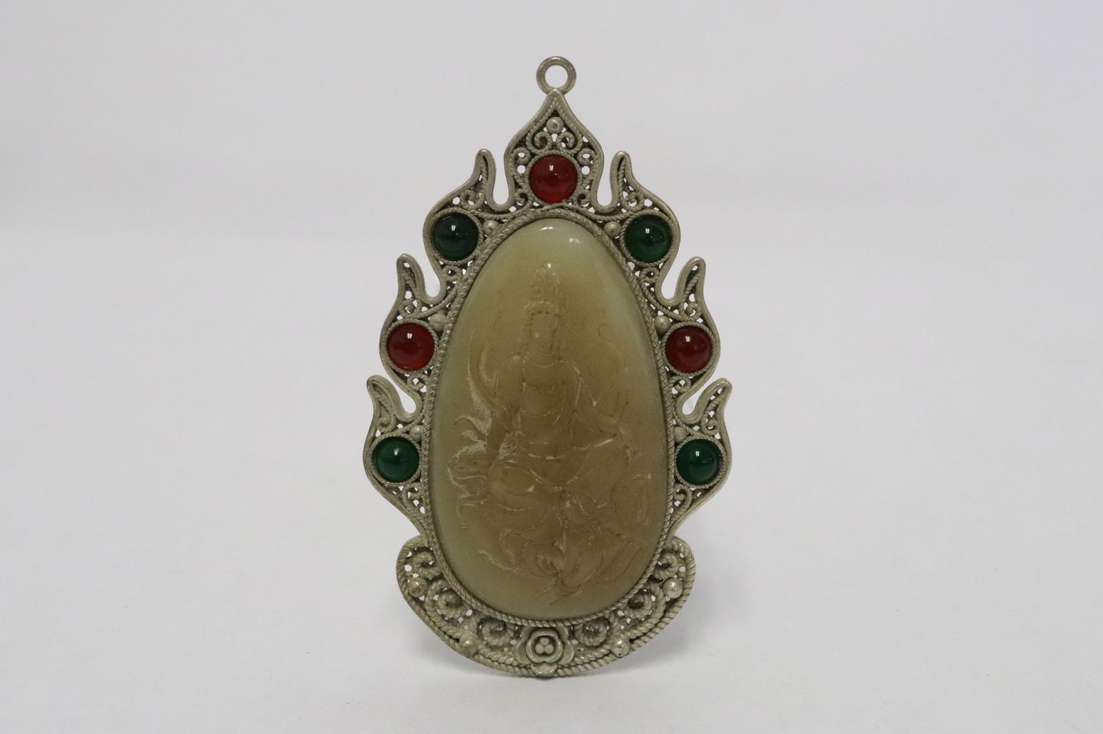 White metal pendant with jade like inset: White metal pendant with jade like inset, 3.3"x1.9"x0.33"