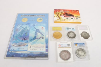 7 packs of reproduction/ souvenir coins
